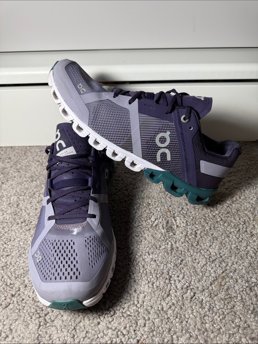 On Running Men’s Athletic Shoes in Purple and Teal Accents